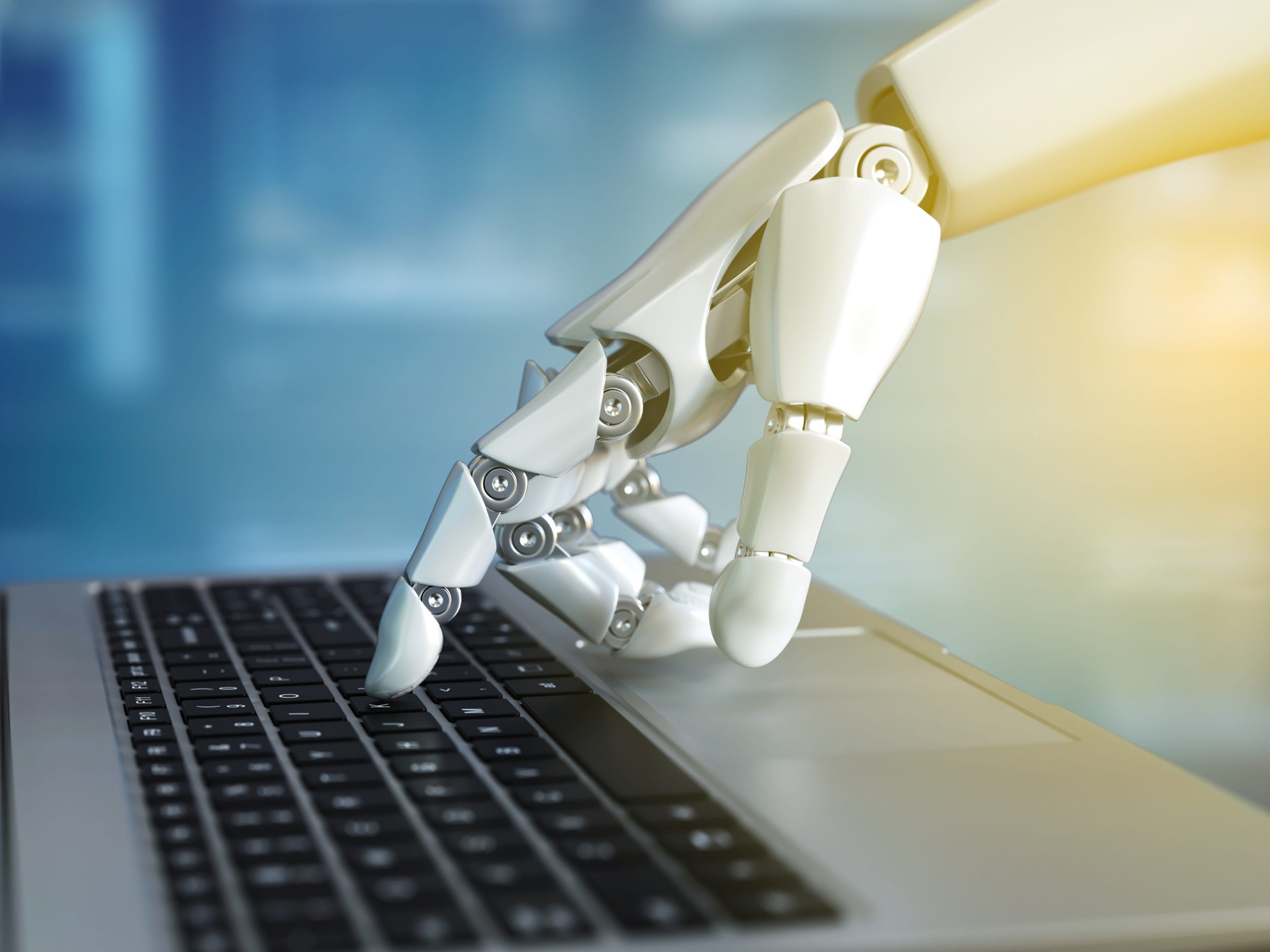 Robot typing on the laptop keyboard -