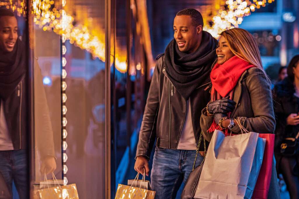 Beautiful Black couple at Christmas Shopping Don't Let the Holiday Season Set You Up for Debt in 2025