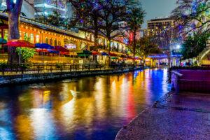 Night Time Scenic Views of the Riverwalk with Christmas Lights on a Rainy Day at San Antonio, Texas.