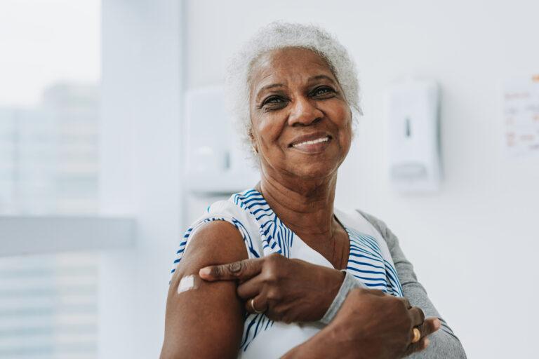 Senior woman with vaccine shot