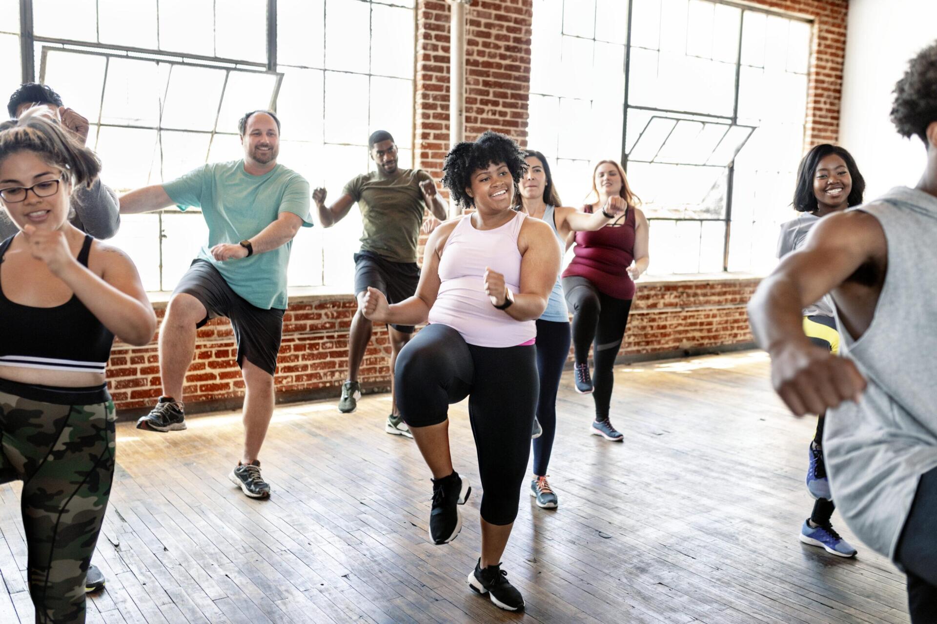 People being active in a fitness class