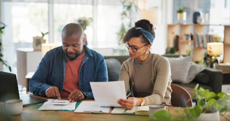Couple going over their finances.